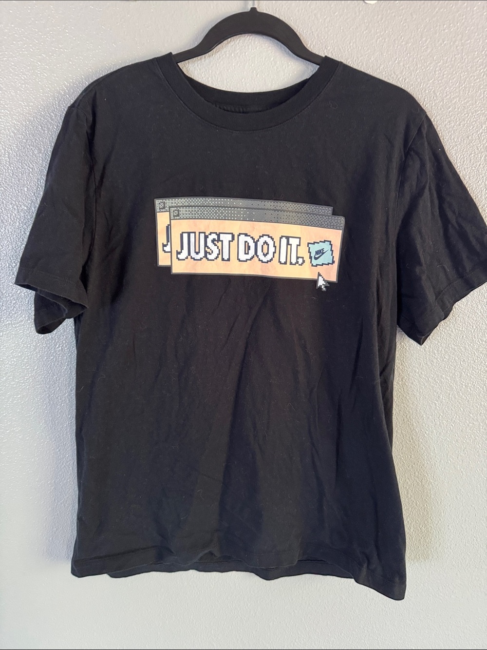 Nike Black Short Sleeve Tee with Peach Graphic "Just Do It."